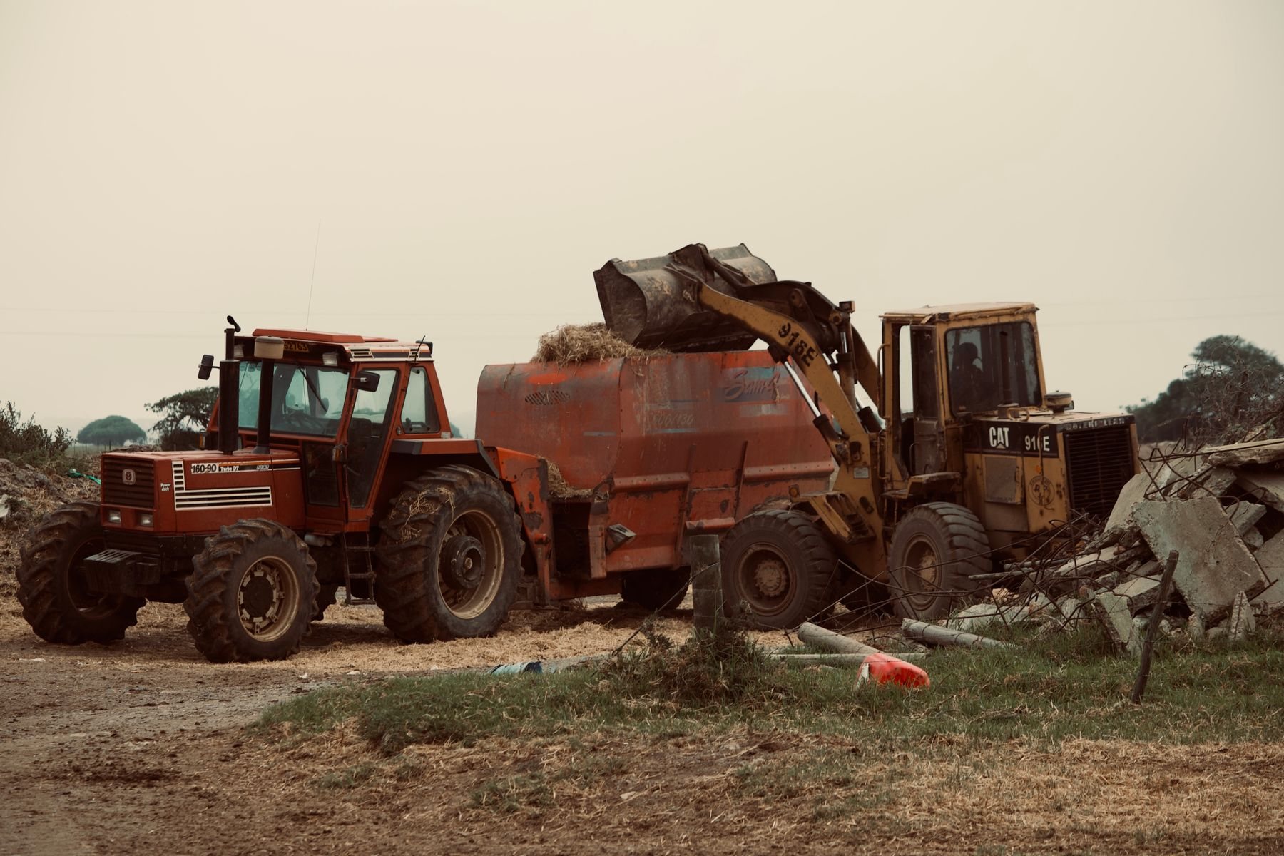 Tractor and loader working on a rural farm in Cape Town, South Africa