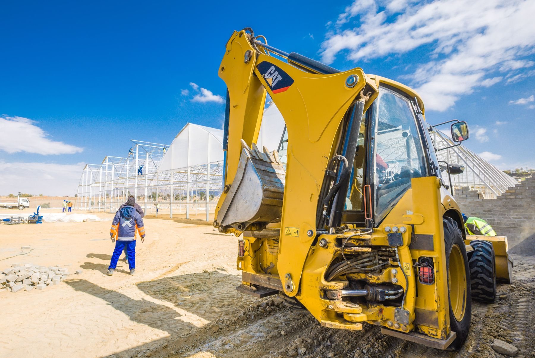 Construction machinery and site crew working in South Africa