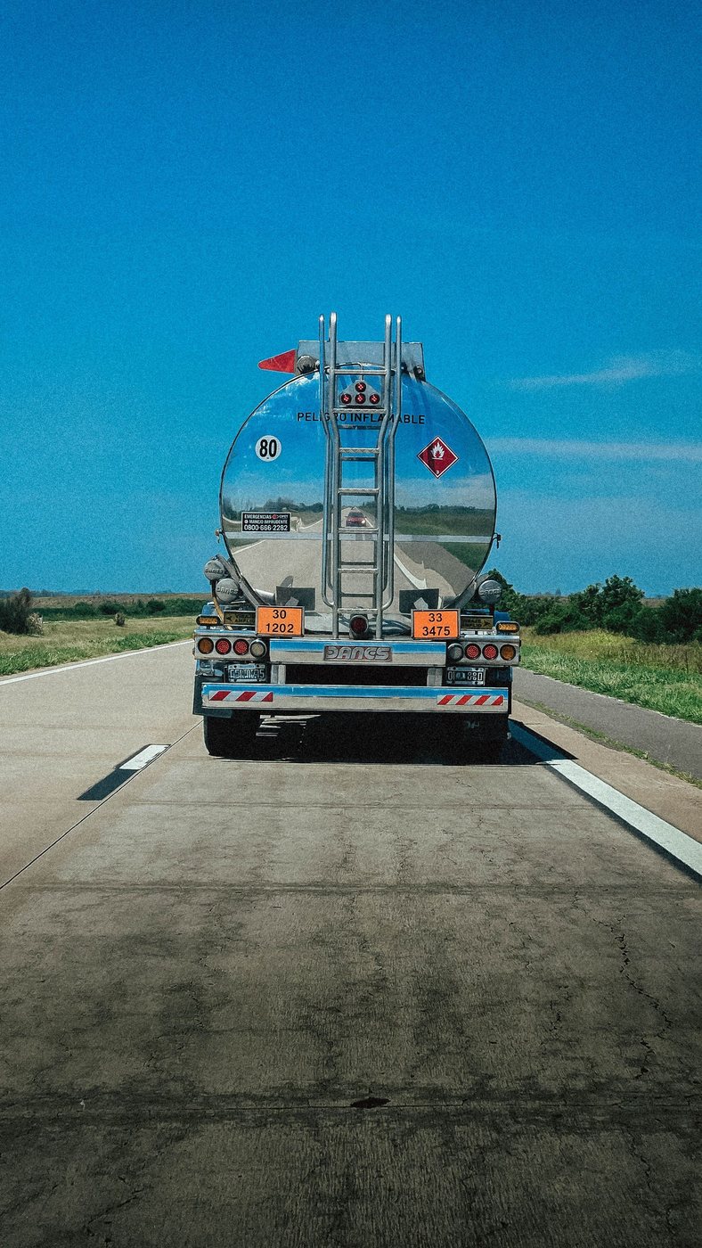 Fuel tanker truck travelling on a highway for bulk delivery